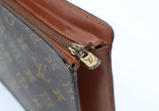 Louis Vuitton Homme Clutch